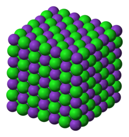 The crystal lattice structure of potassium chloride (KCl), a salt which is formed due to the attraction of K cations and Cl anions. Note how the overall charge of the ionic compound is zero. Potassium-chloride-3D-ionic.png