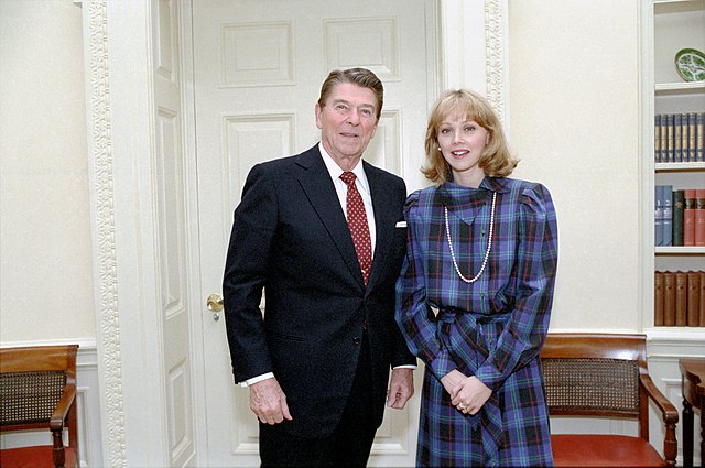 President Ronald Reagan and actress Shelley Long in the Oval Office 2-28-1984