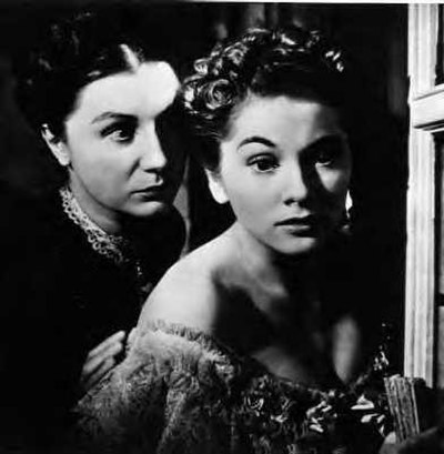 A common theme in thrillers involves innocent victims dealing with deranged adversaries, as seen in Hitchcock's film Rebecca (1940), where Mrs. Danver