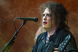 Robert Smith performing at the Roskilde Festival in 2012