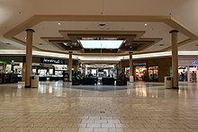 The center of Rushmore Mall near the main entrance Rushmore Mall interior near main entrance in Rapid City, South Dakota.jpg