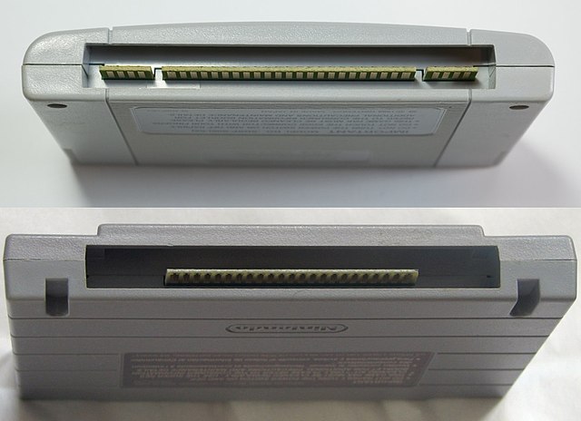 Cases for SFC games in Japan and PAL regions (top) and North American (bottom) regions. Notice the slots in the bottom cartridge to accommodate for pl