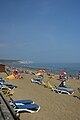 Sandown beach, Sandown, Isle of Wight, viewed from the Esplanade in June 2011, with tourists sunbathing.