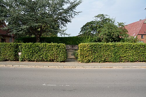 A road in Rade with the memorial to its dead in the two world wars