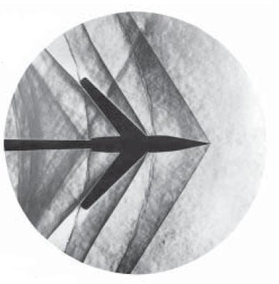 Schlieren photograph of an attached shock on a sharp-nosed supersonic body