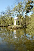 Individual monument belonging to the Lützschena Castle and Castle Park (Obj. 09258349, Schloßweg 9a, 9c, 9d, 9f, 11): Castle (with parts of the original furnishings), farm yard with original paving, orangery, barn and northern farm building as well as riding hall (with horse Sculpture), free-standing bowling alley in the former Russian garden as well as staffage buildings and sculptures in the park (sculpture "Borghesischer Fechter", sandstone sculpture "Jungfrau", remains of the original park buildings including Diana temple, forest chapel, "ex voto" = artificial ruin, burial chapel, mausoleum), as well as the castle park (with forest cemetery and ponds), Kastanienallee and so-called Russian Garden, furthermore historical paving of Kastanienallee