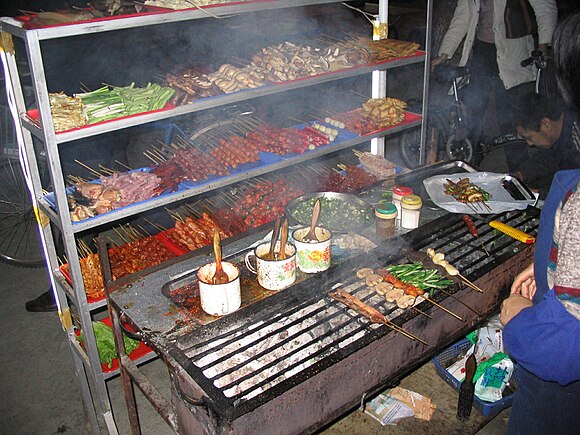 Shaokao (street stall barbecue) outside Chengdu University in Sichuan, China