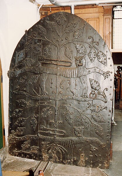 Medieval church door of St Saviour's, with armorial leopards