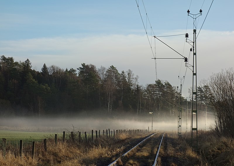 File:Sunlit fog across railway tracks.jpg