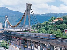 Unique dragon boat architecture of Jiantan on Tamsui-Xinyi line Taipei MRT Jiantan Station and rolling stock 20070507.jpg