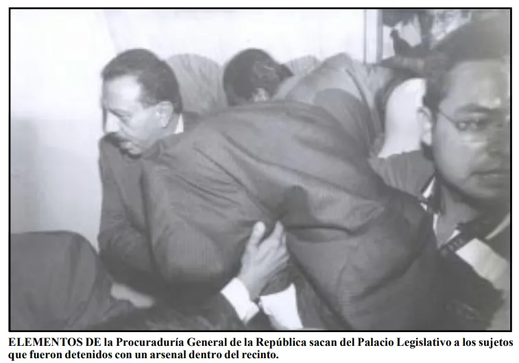 File:The 2001 Mexican Legislative Bombing attempt perpetrators getting detained by the workers.webp