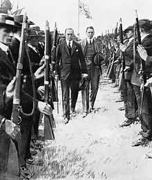 Carson inspecting the UVF, F. E. Smith walking behind him, pre-1914 The Road To War Q81759.jpg