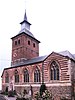 L'église Saint-Pierre: tour, nef centrale, base-nef de droite, chœur avec la tribune des orgues