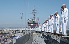 Constellation's crew on deck during the ship's decommissioning ceremony in San Diego, 7 August 2003 USS Constellation decommissioning ceramony.jpg