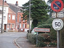 Old half-monthly alternate-side parking sign at the town entrance of Verquigneul, France Verquigneul - Panneau d'entree.JPG