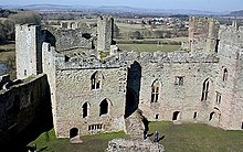 13th-century Solar block (left) and Great Hall (right), in front of the North-West Tower View to Wenlock Edge from Ludlow Castle Keep - trimmed - 1745084.jpg