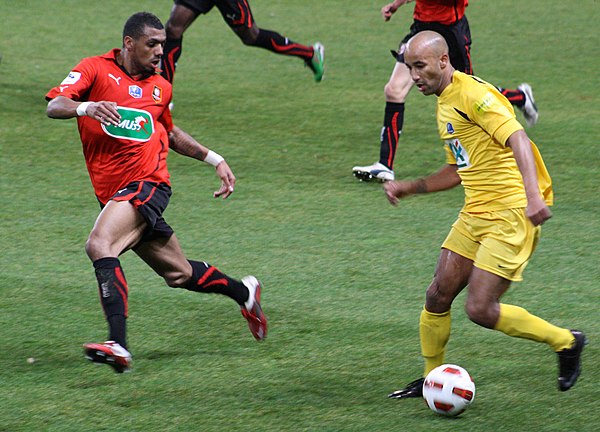 M'Vila (left) scored his first professional goal in the Coupe de France against Cannes in 2011