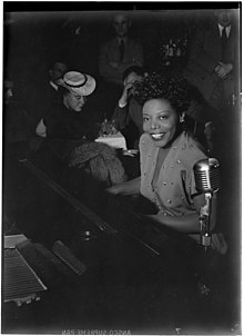 Williams performing at Cafe Society, where she worked before the Town Hall concert (Portrait of Mary Lou Williams, Cafe Society (Downtown), New York, N.Y., ca. June 1947) (LOC) (5189930690).jpg