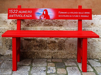 1522 The telephone number to help women who suffer violence. A red bench to remember all the women victims of violence, an initiative to raise awareness against violence against women, this initiative aimed at involving Italian municipalities. Photography is certainly not perfect, but with a high symbolic value. Red bench photographed in front of Palazzo Chigi Zondadari in San Quirico d’Orcia as part of the Wiki Loves Monuments. Thanks for your attention.