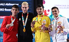 2018-10-18 Karate Boys' -68 kg at 2018 Summer Youth Olympics – Victory ceremony (Martin Rulsch) 44.jpg