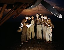 YB-17 Flying Fortress bomber crew receiving instructions at Langley, May 1942 A combat crew receives final instructions just before taking off in a YB-17 bomber from a bombardment squadron base at the field, Langley Field, Va..jpg