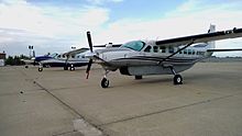 Three Air Choice One aircraft on their hangar's ramp at STL Air Choice One - Hangar Ramp Aircraft.jpg