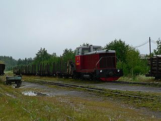TU7-2083 with freight train