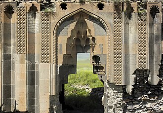 "Church of the Holy Apostles" at Ani, built around the time of the Shaddadids. Ani Surp Arak'elots - Holy Apostles church E facade of south narthex (Muqarnas).jpg