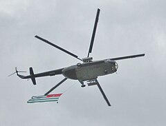 Helicopter towing the Abkhazian flag