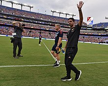 Round as an assistant coach to Mikel Arteta (right) at Arsenal in 2022 Arsenal v Everton - 52223142689.jpg