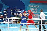 Deutsch: Boxen bei den Olympischen Jugendspielen 2018 Tag 12, 18. Oktober 2018 - Finale im Leichten Weltergewicht Jungen – Ilia Popov (Russland, rot) schlägt Talgat Shaiken (Kasachstan, blau) 4-1; Ringrichter ist James Beckles (Trinidad und Tobago). English: Boxing at the 2018 Summer Youth Olympics on 18 October 2018 – Final Light Welterweight Boys Bout - Ilia Popov (Rusia, rojo) supera a Talgat Shaiken (Kazajstán, azul) 4-1; Referee is James Beckles (Trinidad and Tobago). Español: Boxeo en los Juegos Olímpicos Juveniles de Verano de 2018 en 18 de octubre de 2018 - Chicos de peso welter ligero final: Ilia Popov (Uzbekistán, roja) le gana a Talgat Shaiken (Egipto, azul) 4-1; El árbitro es James Beckles (Trinidad y Tobago).