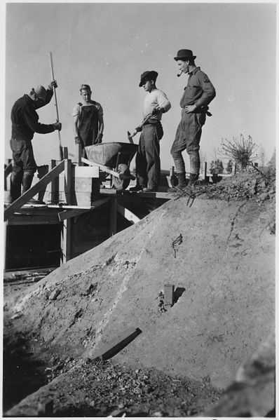 File:CCC Camp BR-78 Orland Project, California, "Check being poured on Lateral 100." - NARA - 293570.jpg