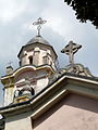 Il campanile e la facciata della chiesa di San Carlo, Cassingheno, Fascia, Liguria, Italia