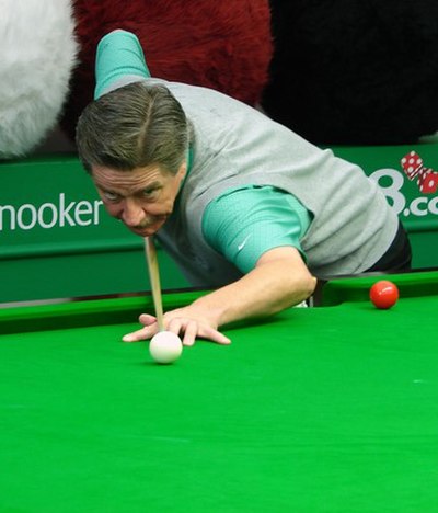 Cliff Thorburn (pictured in 2007) progressed to the semi-finals by defeating qualifier Steve James 13–11.