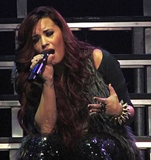 Lovato performing "Fix a Heart" during her A Special Night with Demi Lovato tour in 2011 Demi Lovato, We The Kings 4, 2011.jpg