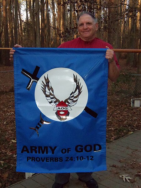 File:Donald Spitz holds Army of God Banner.jpg