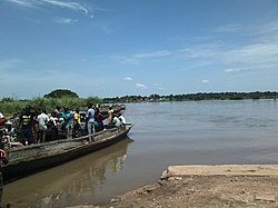 Ferrying a car across River Benue at Vandykia.jpg