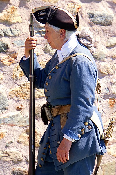 File:Fortress Louisbourg DSC02456 - Guard talking to a tourist (8176659985).jpg