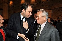 פאביו קורסיקו עם שר הכלכלה והאוצר האיטלקי לשעבר, ג'וליו טרמונטי
