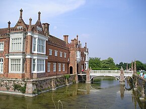 Helmingham Hall, showing its 60-foot wide moat and drawbridge (left, without railings) Helmingham Hall 01.jpg