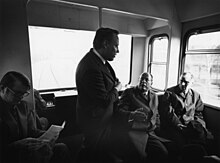 Unto Valtanen (middle) at the handover of the M1 test train on 4 May 1972. Also pictured is the mayor Teuvo Aura (centre-right) and deputy mayor Veikko O. Jarvinen [fi] (left). Helsinki-metro-inauguration-1972.jpg