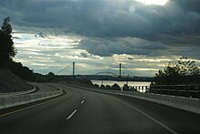 Highway 17 looking South near Port Mann (Surrey) British Columbia. New and old Port Mann Bridge in background. Highway17PortMann.JPG