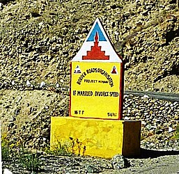 Safety sign: "IF MARRIED, DIVORCE SPEED"