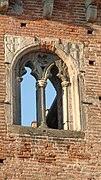 A double lancet window in the 14th century castle at Ivrea in the Piedmont region of Italy