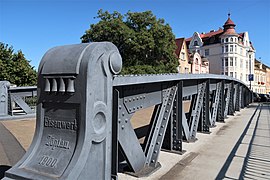 Nýtovaný most přes řeku Opavu v Opavské ulici