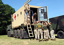 A Mobile Trauma Bay mounted on an Oshkosh Logistic Vehicle System Replacement (LVSR) LVSR with Mobile Trauma Bay.jpg