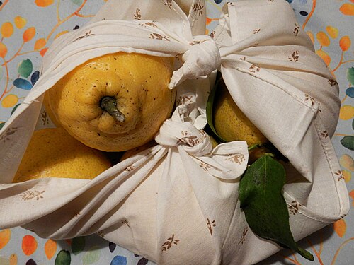 Lemons as a gift in wrapping cloth