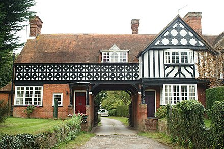 Twin, common mock tudor homes in the village, in this case however, a crossover between a single-family and a semi-detached house