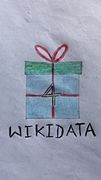 Logo of Wikidata's 4th Birthday, Art by Tulsi Bhagat in the context of Maithili Wikimedians User Group.jpeg