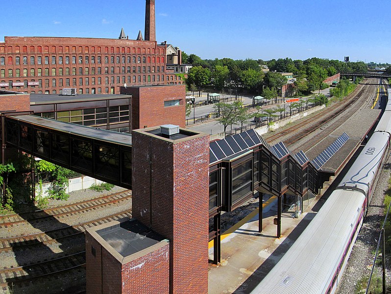 File:Lowell station with train from garage roof, August 2012.jpg